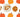 Assorted fall nuts and dried fruits in bowls and a paper bag with pumpkin-themed background